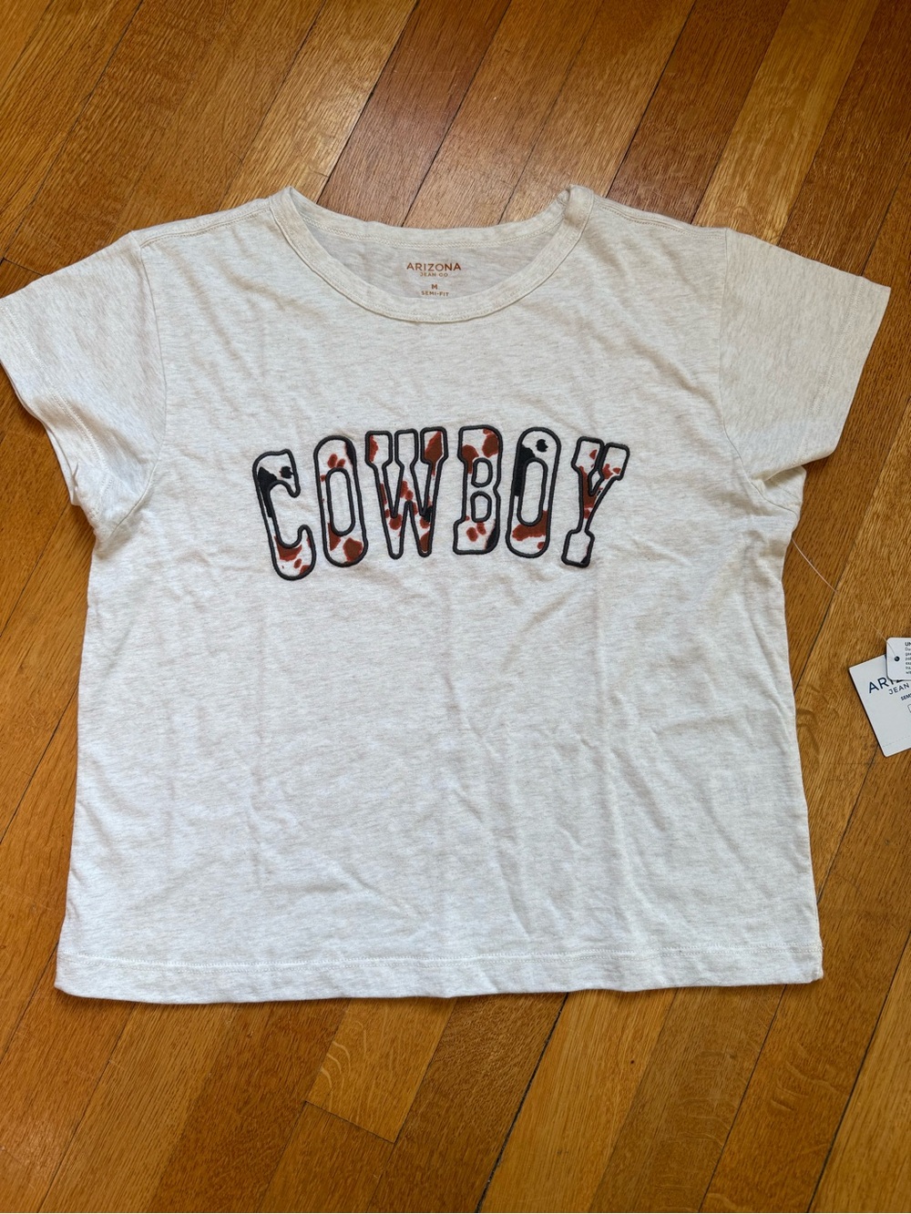 Arizona Jean Company juniors Cream "Cowboy" Graphic Tee